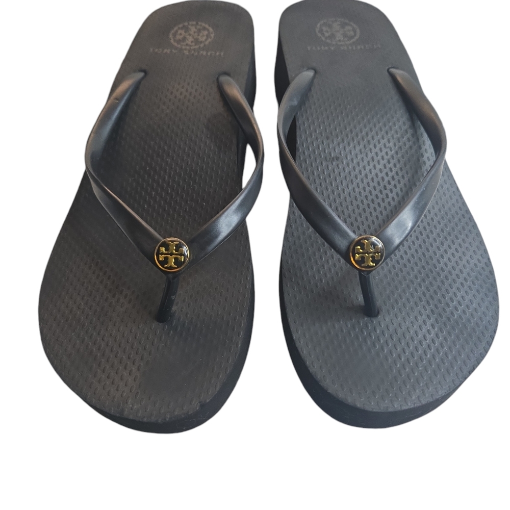 They Burch platform wedge flip flops